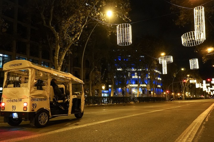 a bus on a city street at night