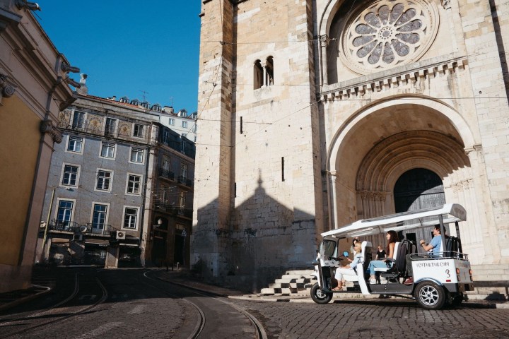 a large clock tower in front of a building